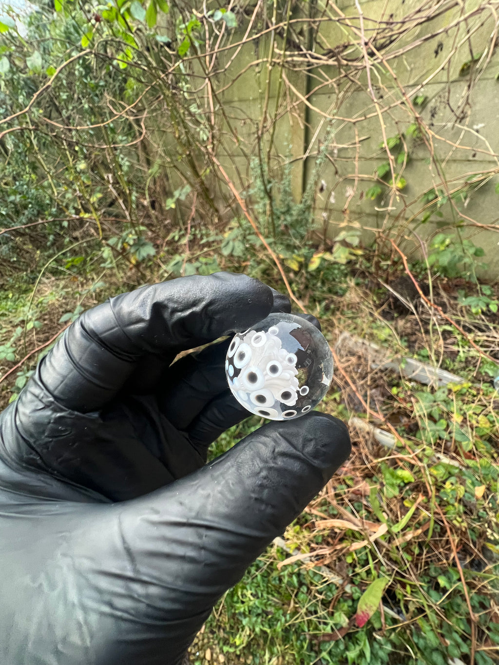 White flower implosion with dots marble