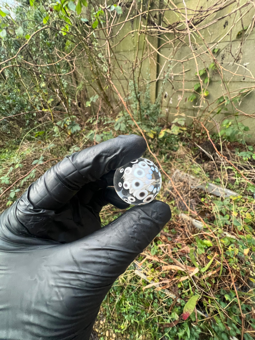 White flower implosion with dots marble